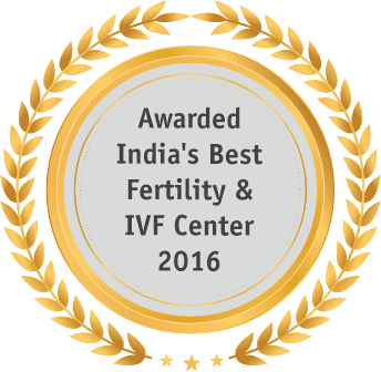 A gold medal with the words awarded India's best fertility & IVF Center to Milann.