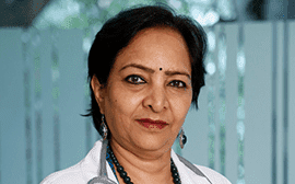 Dr. Kamini Rao confidently posing as the face of Milann Fertility center.
